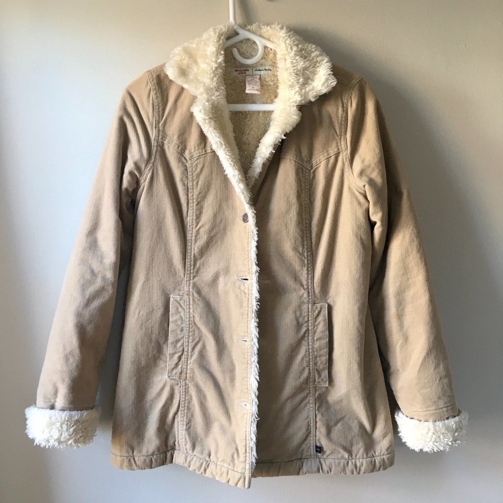 Classic camel-colored sherpa-lined coat